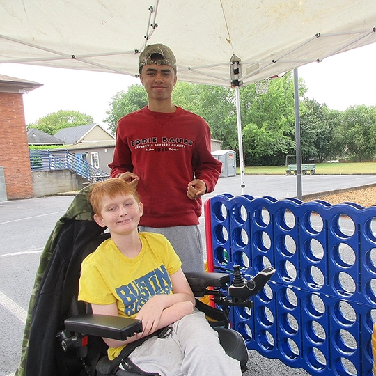 Evan and friend outside