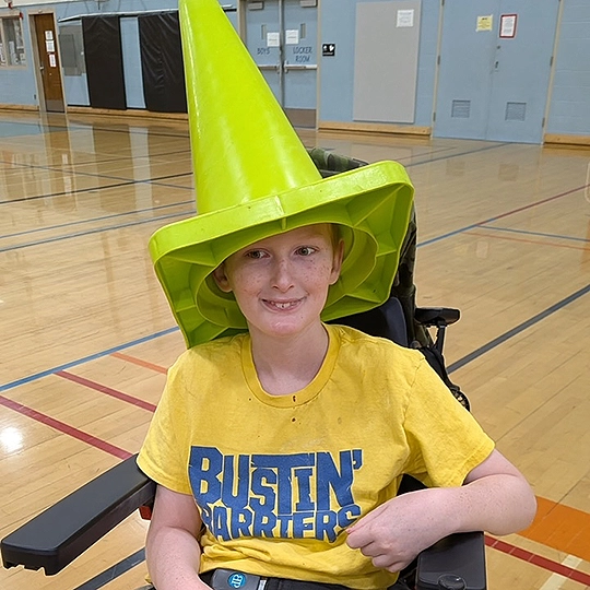 Evan wears a funny cone