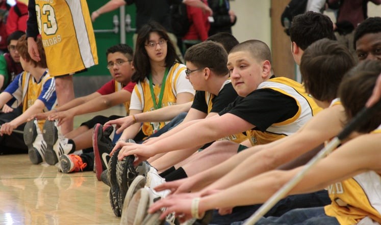 Kids stretching before a basketball game